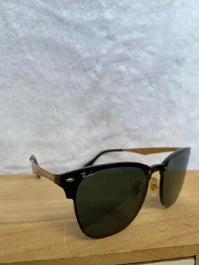 Ray-Ban Black Frames with Gold Accents